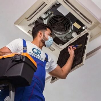 QR Corporation HVAC technician providing air conditioning services